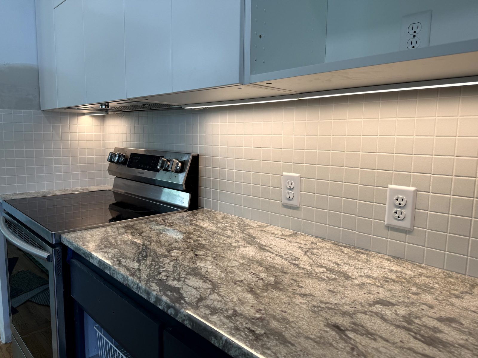 Kitchen remodel with granite counters and tile backsplash